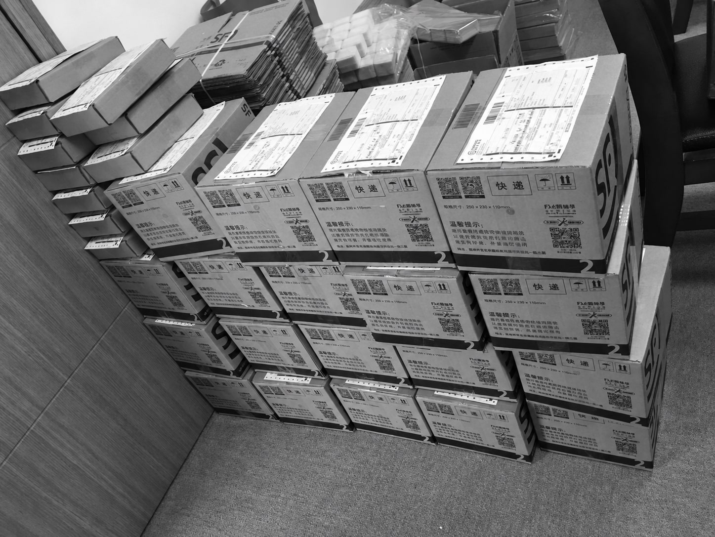 An archival photograph of packed shipping cartons ready for dispatch.